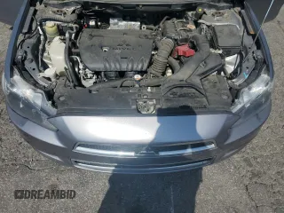 2014 Mitsubishi Lancer SE z VIN JA32V2FW3EU021070, wystawiony jako Copart lot #58239705 z przebiegiem 120 060 mil mil oraz Szkoda całkowita • Salvage title. Historia ofert i sprzedaży dostępna na DreamBid. Obrazek 11.