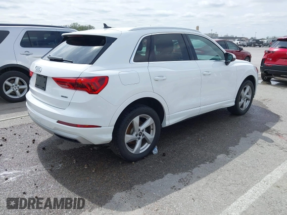 2021 Audi Q3 Premium with VIN WA1AUCF33M1096437, listed as a IAAI auction lot 41910411 with 86,837 mi miles and . Bid and sale history available at DreamBid. Image 4.