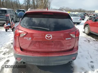2013 Mazda CX-5 Sport with VIN JM3KE4BE4D0120911, listed as a Copart auction lot 44228415 with 220,487 mi miles and Salvage Title. Bid and sale history available at carsss.com. Image 6.