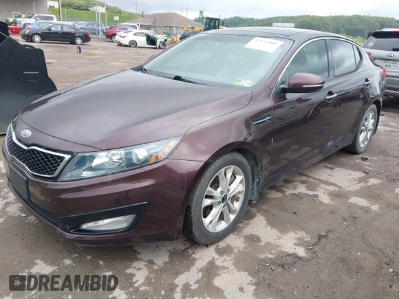 2011 Kia Optima EX with VIN KNAGN4A69B5148919, listed as a IAAI auction lot 42133805 with 112,114 mi miles and . Bid and sale history available at carsss.com. Image 2.