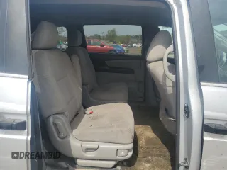 2013 Honda Odyssey LX z VIN 5FNRL5H28DB085114, wystawiony jako Copart lot #52942495 z przebiegiem 158 191 mil mil oraz Szkoda całkowita • Salvage title. Historia ofert i sprzedaży dostępna na DreamBid. Obrazek 11.