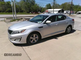 2014 Kia Optima LX with VIN 5XXGM4A70EG340051, listed as a IAAI auction lot 42048762 with 146,519 mi miles. Bid and sale history available at carsss.com. Image 2.