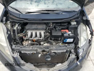 2011 Honda Fit Sport z VIN JHMGE8H51BC015640, wystawiony jako Copart lot #57870555 z przebiegiem 179 497 mil mil oraz Szkoda całkowita • Salvage title. Historia ofert i sprzedaży dostępna na DreamBid. Obrazek 12.
