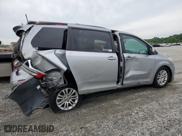 2015 Toyota Sienna XLE с VIN 5TDYK3DC7FS571431, выставлен на аукционе Copart как лот 57173595 с пробегом 305 940 миль миль и Списание • Salvage title. История ставок и продаж доступна на DreamBid. Изображение 3.