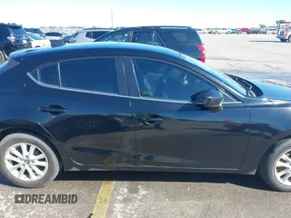 2014 Mazda 3 i Grand Touring z VIN JM1BM1M78E1159912, wystawiony jako IAAI lot #42079661 z przebiegiem 105 039 mil mil oraz . Historia ofert i sprzedaży dostępna na DreamBid. Obrazek 14.