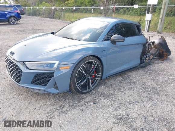 2021 Audi R8 z VIN WUAKBAFX5M7900468, wystawiony jako IAAI lot #41214857 z przebiegiem Nie podano mil oraz . Historia ofert i sprzedaży dostępna na DreamBid. Obrazek 2.