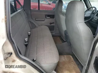 1996 Jeep Cherokee Sport z VIN 1J4FJ68S3TL103684, wystawiony jako Copart lot #63466265 z przebiegiem 163 715 mil mil oraz Czysty tytuł • Clean title. Historia ofert i sprzedaży dostępna na DreamBid. Obrazek 10.