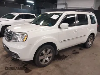 2015 Honda Pilot Touring with VIN 5FNYF4H98FB001841, listed as a IAAI auction lot 41955645 with 109,818 mi miles. Bid and sale history available at carsss.com. Image 17.
