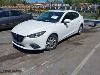 2016 Mazda Mazda3 i Grand Touring with VIN JM1BM1X79G1319469, listed as a IAAI auction lot 41929229 with 121,883 mi miles. Bid and sale history available at carsss.com. Image 2.