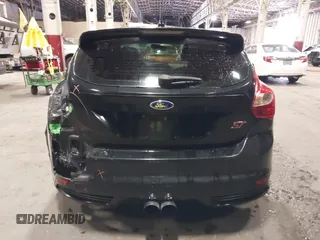2014 Ford Focus ST with VIN 1FADP3L96EL355713, listed as a IAAI auction lot 41572939 with 102,838 mi miles and . Bid and sale history available at carsss.com. Image 17.