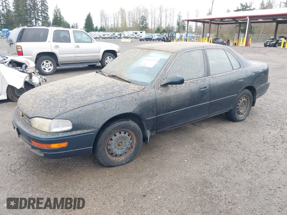 1994 Toyota Camry LE z VIN JT2GK12E1R0036423, wystawiony jako IAAI lot #41922375 z przebiegiem 211 529 mil mil oraz . Historia ofert i sprzedaży dostępna na DreamBid. Obrazek 2.