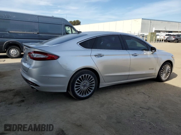 2013 Ford Fusion Titanium Hybrid with VIN 3FA6P0RU9DR303852, listed as a Copart auction lot 50652425 with 98,504 mi miles and Salvage Title. Bid and sale history available at DreamBid. Image 3.