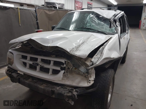 2000 Ford Explorer z VIN 1FMYU60XXYUA34664, wystawiony jako IAAI lot #41980401 z przebiegiem 179 946 mil mil oraz . Historia ofert i sprzedaży dostępna na DreamBid. Obrazek 6.