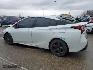 2021 Toyota Prius L Eco with VIN JTDKAMFU5M3129119, listed as a Copart auction lot 47732205 with 66,110 mi miles and Salvage Title. Bid and sale history available at carsss.com. Image 2.