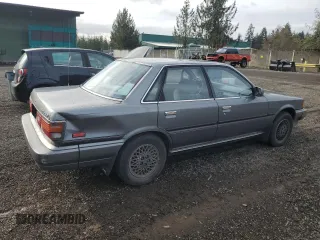 1988 Toyota Camry LE z VIN JT2SV22E0J0237998, wystawiony jako Copart lot #78850584 z przebiegiem 165 880 mil mil oraz Szkoda całkowita • Salvage title. Historia ofert i sprzedaży dostępna na DreamBid. Obrazek 3.