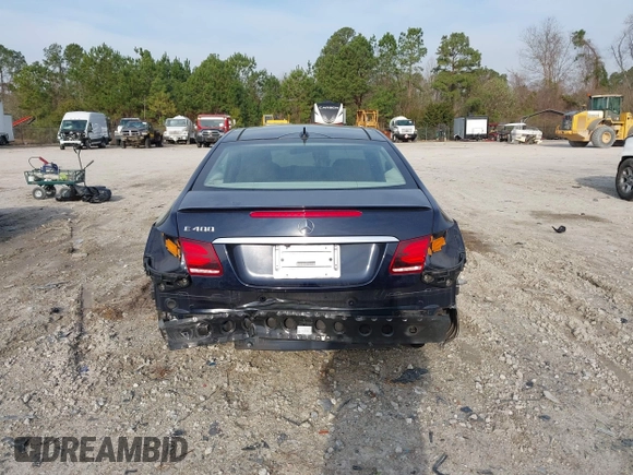 2015 Mercedes-Benz E-Class E 400 with VIN WDDKJ6FB4FF307393, listed as a IAAI auction lot 41775634 with 100,928 mi miles. Bid and sale history available at carsss.com. Image 16.