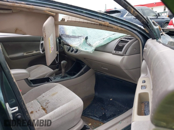 2002 Toyota Camry XLE z VIN 4T1BF32K02U522335, wystawiony jako IAAI lot #42037459 z przebiegiem 214 832 mil mil oraz . Historia ofert i sprzedaży dostępna na DreamBid. Obrazek 5.
