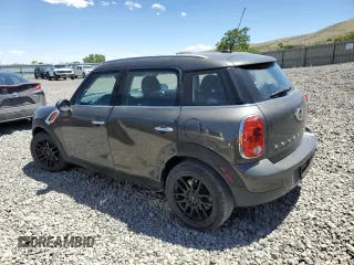 2014 MINI Countryman with VIN WMWZB3C56EWR38919, listed as a Copart auction lot 61385865 with 127,368 mi miles and Salvage title. Bid and sale history available at DreamBid. Image 2.