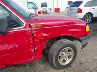 2003 Mazda B-Series 2WD Truck SE with VIN 4F4YR46V33TM13768, listed as a IAAI auction lot 41351910 with 212,641 mi miles. Bid and sale history available at carsss.com. Image 13.