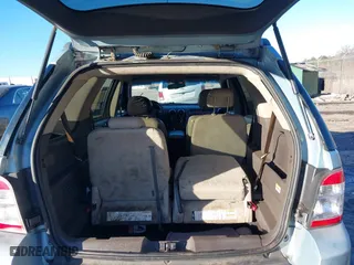2008 Ford Taurus X SEL with VIN 1FMDK02W58GA33572, listed as a IAAI auction lot 41386299 with 174,484 mi miles. Bid and sale history available at carsss.com. Image 8.