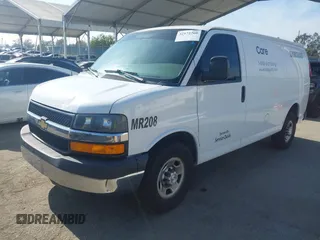 2016 Chevrolet Express Cargo Van with VIN 1GCWGAFF0G1323959, listed as a IAAI auction lot 42172260 with 211,384 mi miles. Bid and sale history available at carsss.com. Image 2.