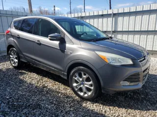 2013 Ford Escape SEL with VIN 1FMCU9HX9DUC36700, listed as a Copart auction lot 49236745 with 124,413 mi miles and Clean Title. Bid and sale history available at carsss.com. Image 4.