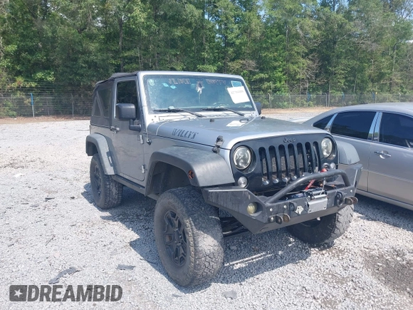2015 Jeep Wrangler Freedom Edition with VIN 1C4AJWAG4FL589769, listed as a IAAI auction lot 42704488 with 194,414 mi miles and . Bid and sale history available at DreamBid. Image 1.