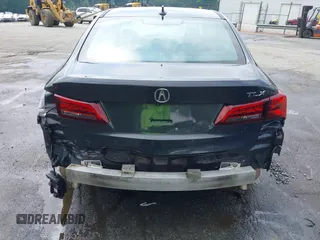 2015 Acura TLX Technology z VIN 19UUB2F5XFA013238, wystawiony jako IAAI lot #42258541 z przebiegiem 154 319 mil mil oraz . Historia ofert i sprzedaży dostępna na DreamBid. Obrazek 6.