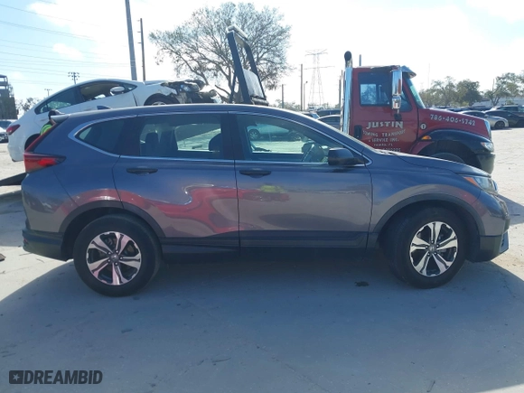 2020 Honda CR-V LX with VIN 7FARW1H29LE009775, listed as a IAAI auction lot 41571693 with 60,794 mi miles. Bid and sale history available at carsss.com. Image 13.