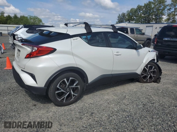 2018 Toyota C-HR XLE with VIN NMTKHMBX9JR060424, listed as a Copart auction lot 57913775 with 104,847 mi miles and Salvage title. Bid and sale history available at DreamBid. Image 3.