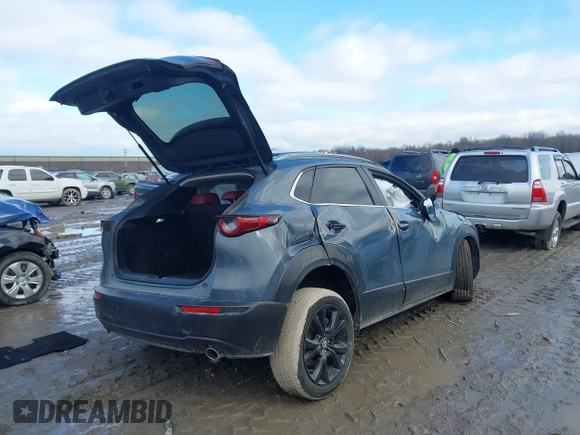 2023 Mazda CX-30 2.5 S Carbon Edition with VIN 3MVDMBCM5PM560926, listed as a IAAI auction lot 41488087 with 26,035 mi miles. Bid and sale history available at carsss.com. Image 4.