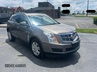 2011 Cadillac SRX Luxury Collection z VIN 3GYFNAEYXBS637693, wystawiony jako Copart lot #60371925 z przebiegiem 122 464 mil mil oraz Czysty tytuł • Clean title. Historia ofert i sprzedaży dostępna na DreamBid. Obrazek 1.