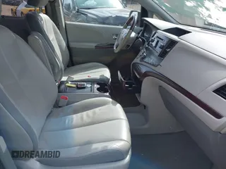 2012 Toyota Sienna XLE with VIN 5TDDK3DC3CS041984, listed as a IAAI auction lot 41711974 with 149,879 mi miles. Bid and sale history available at carsss.com. Image 5.