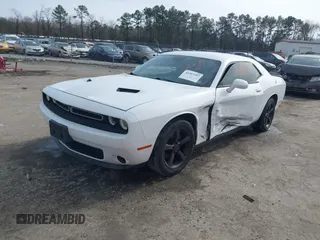 2016 Dodge Challenger SXT z VIN 2C3CDZAG6GH263508, wystawiony jako IAAI lot #41587297 z przebiegiem 119 114 mil mil oraz . Historia ofert i sprzedaży dostępna na DreamBid. Obrazek 2.
