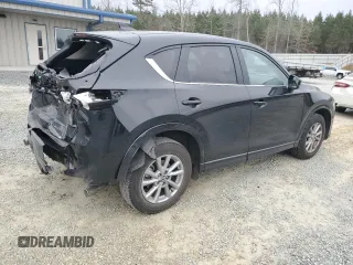 2024 Mazda CX-5 S Carbon Edition z VIN JM3KFBCLXR0496504, wystawiony jako Copart lot #48319375 z przebiegiem 19 041 mil mil oraz Szkody całkowita. Historia ofert i sprzedaży dostępna na DreamBid. Obrazek 3.
