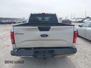 2015 Ford F-150 XLT with VIN 1FTEX1E82FFC23636, listed as a IAAI auction lot 41835465 with 149,801 mi miles. Bid and sale history available at carsss.com. Image 16.