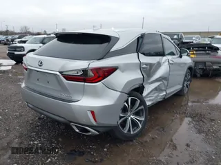 2019 Lexus RX with VIN 2T2ZZMCA8KC147017, listed as a IAAI auction lot 41557384 with 47,153 mi miles. Bid and sale history available at carsss.com. Image 4.
