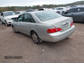 2003 Toyota Avalon XL with VIN 4T1BF28B33U329115, listed as a IAAI auction lot 41015769 with 166,726 mi miles and . Bid and sale history available at carsss.com. Image 3.