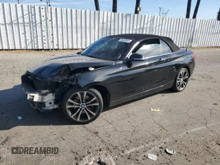 2015 BMW 2 Series 228i with VIN WBA1K5C59FV242992, listed as a Copart auction lot 75433654 with Not Provided miles and Salvage Title. Bid and sale history available at carsss.com. Image 1.