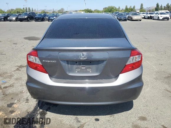 2012 Honda Civic LX z VIN 2HGFB2F59CH603985, wystawiony jako Copart lot #55675435 z przebiegiem 125 567 mil mil oraz Szkoda całkowita • Salvage title. Historia ofert i sprzedaży dostępna na DreamBid. Obrazek 6.