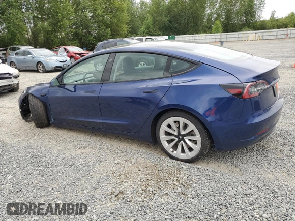 2023 Tesla Model 3 with VIN 5YJ3E1EA7PF450973, listed as a Copart auction lot 61082175 with 47,029 mi miles and Salvage title. Bid and sale history available at DreamBid. Image 2.