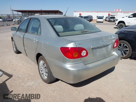 2004 Toyota Corolla CE with VIN 1NXBR32E64Z283247, listed as a IAAI auction lot 42121254 with 292,754 mi miles. Bid and sale history available at carsss.com. Image 3.