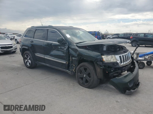 2011 Jeep Grand Cherokee Laredo z VIN 1J4RR4GG1BC520579, wystawiony jako Copart lot #60860794 z przebiegiem 196 271 mil mil oraz Szkoda całkowita • Salvage title. Historia ofert i sprzedaży dostępna na DreamBid. Obrazek 4.