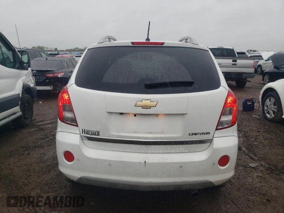 2013 Chevrolet Captiva Sport LTZ with VIN 3GNAL4EK9DS593392, listed as a Copart auction lot 72373684 with 127,984 mi miles and Salvage Title. Bid and sale history available at DreamBid. Image 6.