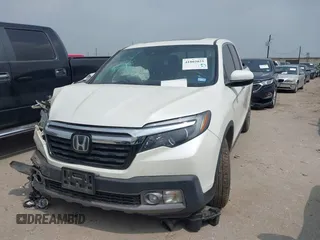 2018 Honda Ridgeline RTL-E with VIN 5FPYK3F77JB004379, listed as a IAAI auction lot 41802025 with 132,085 mi miles and . Bid and sale history available at DreamBid. Image 17.