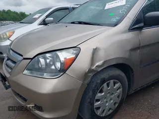 2005 Honda Odyssey LX with VIN 5FNRL382X5B116840, listed as a IAAI auction lot 42070477 with 268,898 mi miles. Bid and sale history available at carsss.com. Image 6.