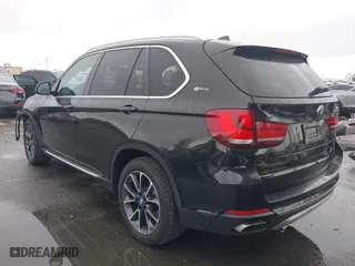2018 BMW X5 xDrive40e iPerformance with VIN 5UXKT0C54J0V99573, listed as a IAAI auction lot 41490567 with 50,650 mi miles. Bid and sale history available at carsss.com. Image 3.