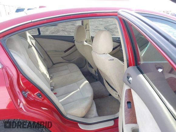 2009 Nissan Altima S with VIN 1N4AL21E29N429311, listed as a IAAI auction lot 41832054 with 144,488 mi miles and . Bid and sale history available at DreamBid. Image 8.