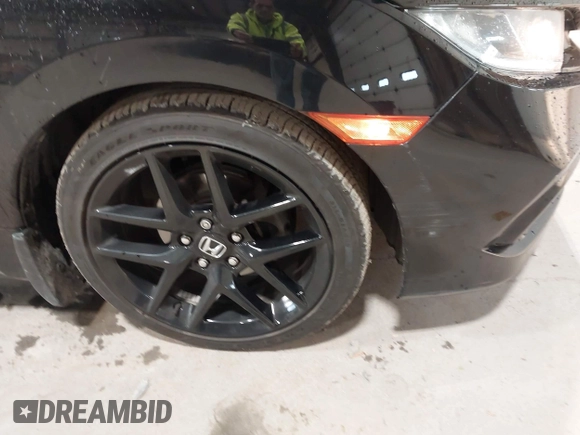 2019 Honda Civic Sport with VIN 2HGFC2F89KH557466, listed as a IAAI auction lot 42335216 with 138,747 mi miles and . Bid and sale history available at DreamBid. Image 6.
