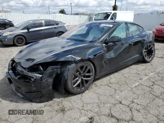 2022 Tesla Model S Plaid with VIN 5YJSA1E69NF460808, listed as a Copart auction lot 48766764 with 12,836 mi miles and Salvage Title. Bid and sale history available at DreamBid. Image 1.